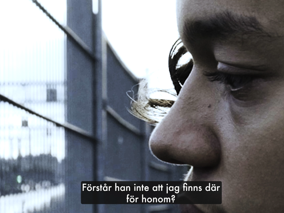 Person som sitter på en trappa